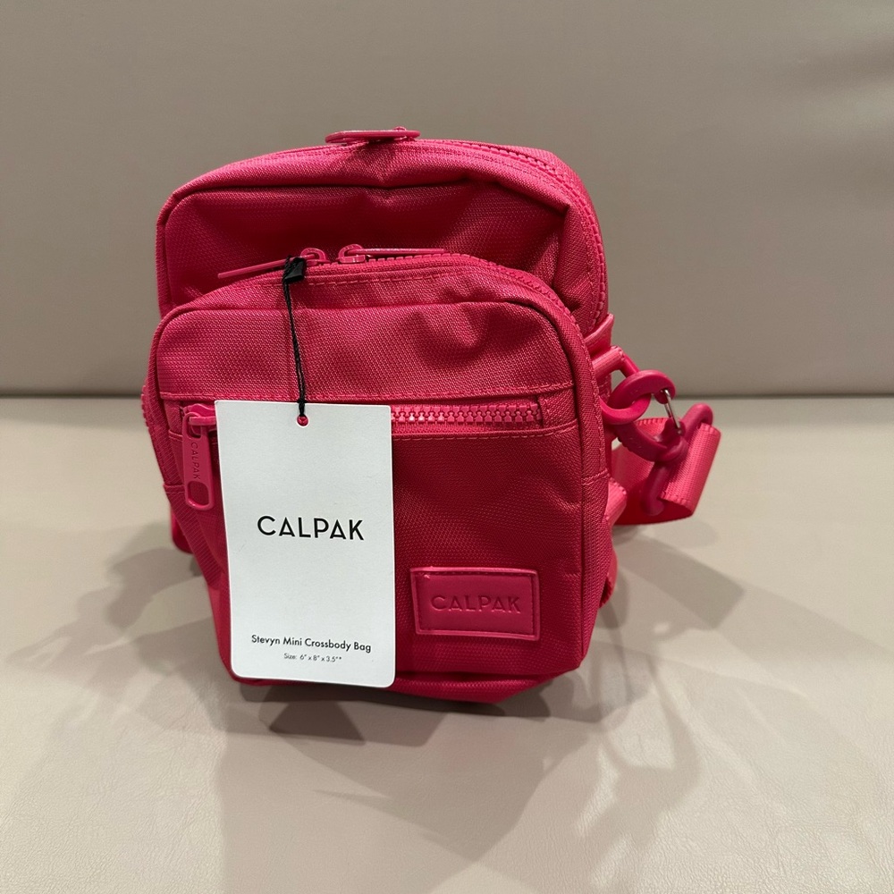 CALPAK Stevyn Mini Crossbody Bag Purse
Dragon Fruit NWT